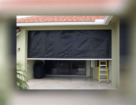 fabric vs metal hurricane shutters|roll down hurricane screens cost.